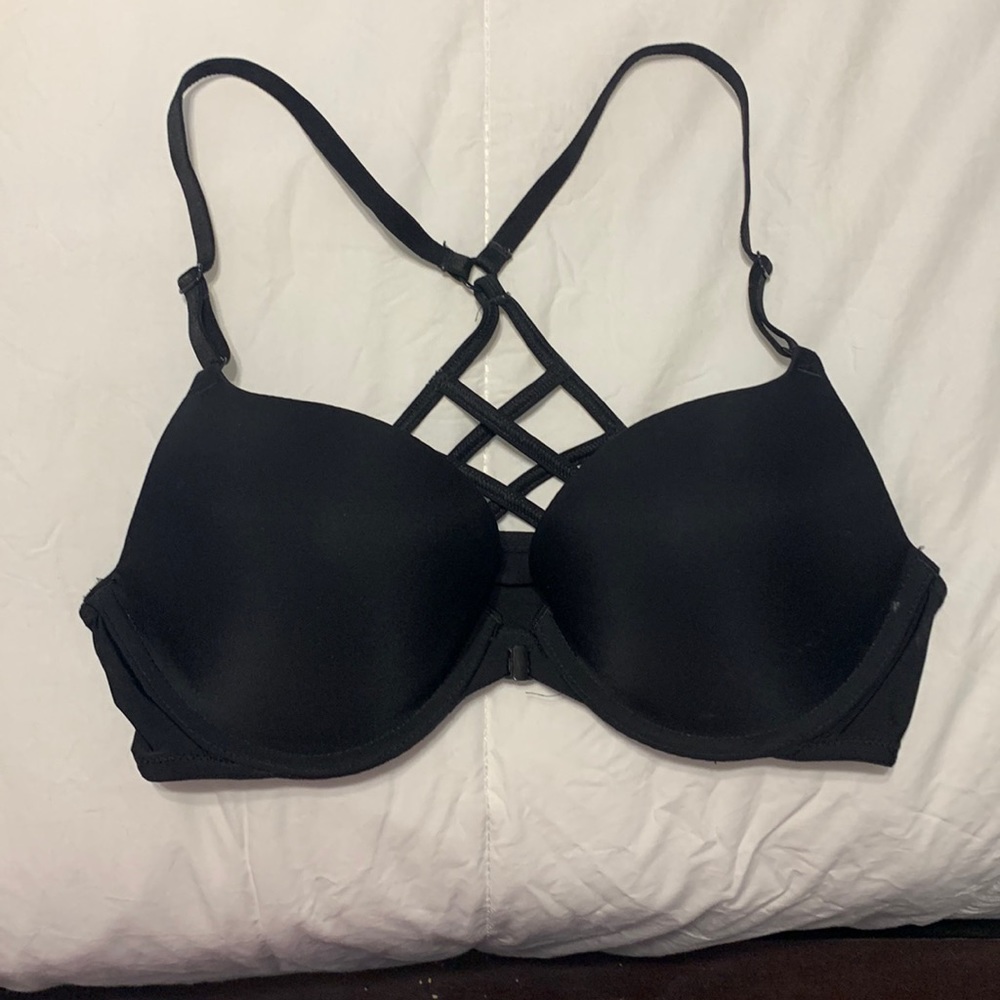 Barely worn cute Victoria padded bra with front enclosure and cross cross back